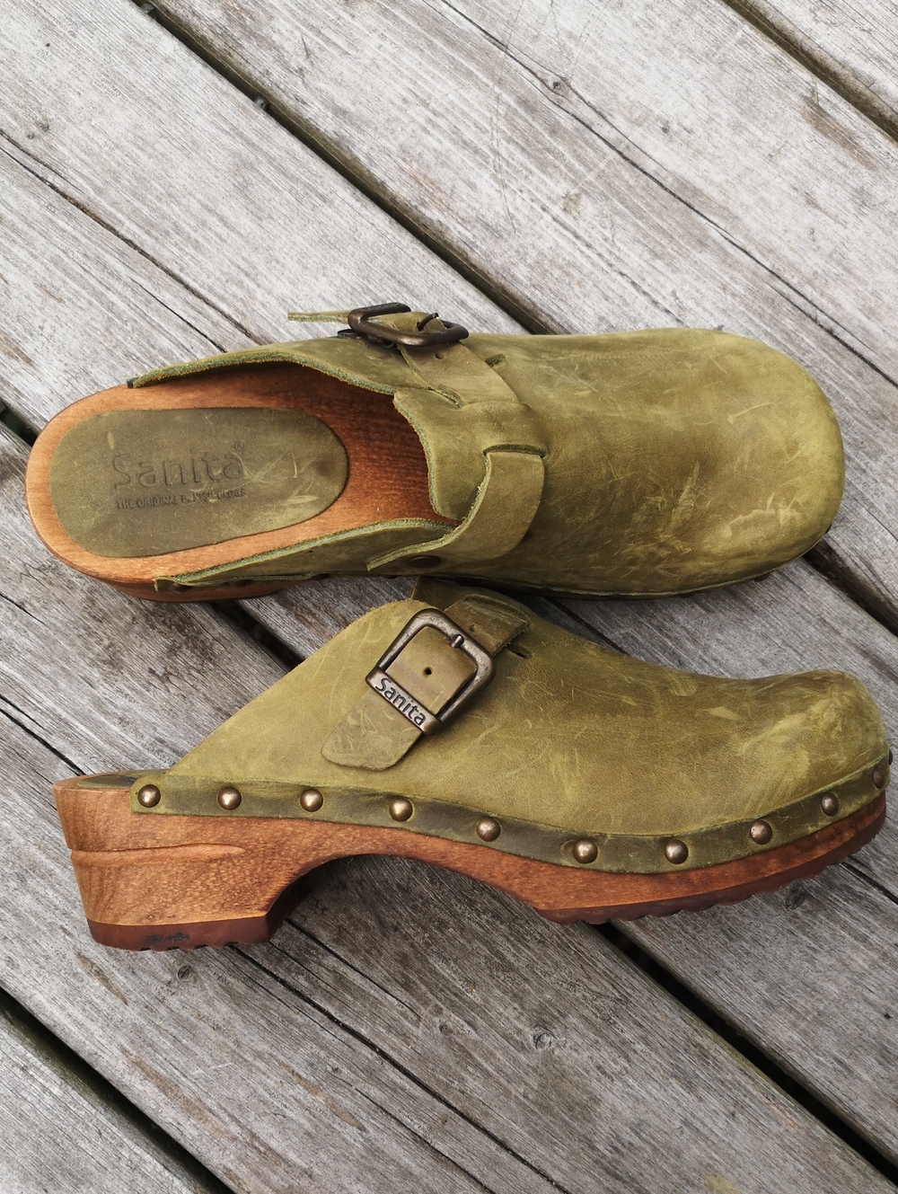 Sanita green leather clogs